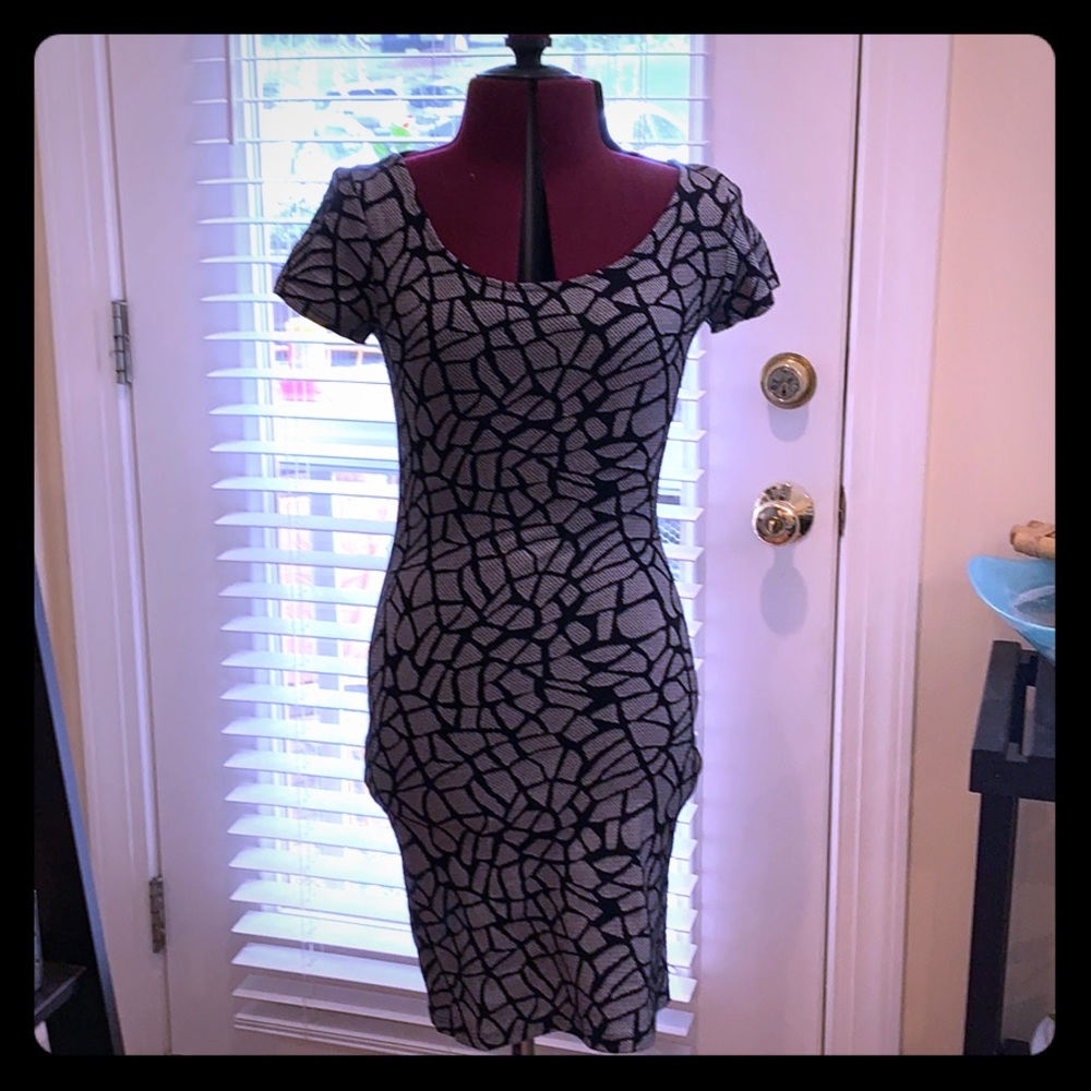 Soprano cross back body con dress